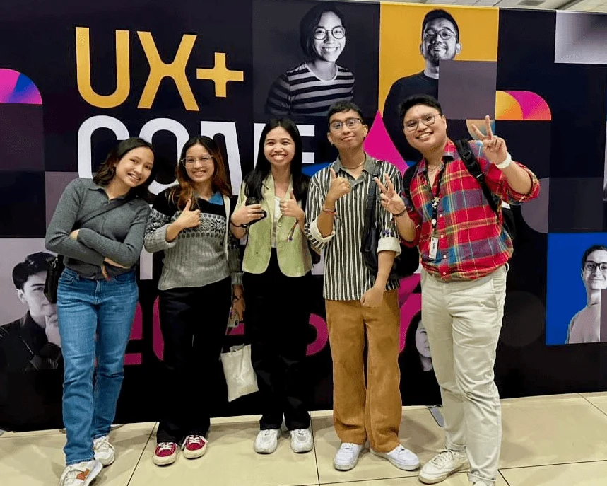 Alex with friends at the UX+ conference